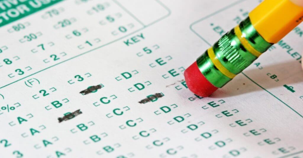 filling in a test sheet on an EPA Section 608 exam